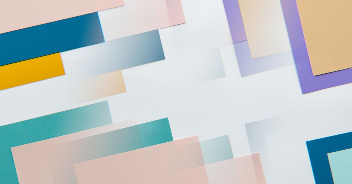 A creative arrangement of colorful overlapping rectangles and shapes on a beige background.